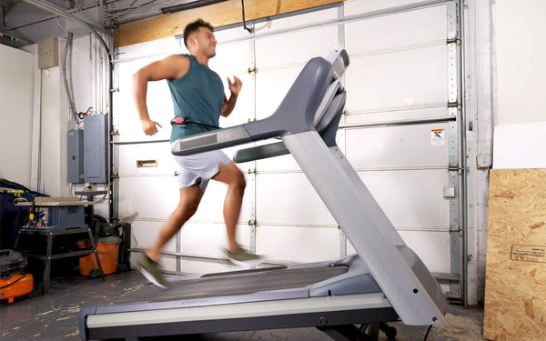 Man running on treadmill at full speed and on steep incline using Treadmill Max treadmill stability belt
